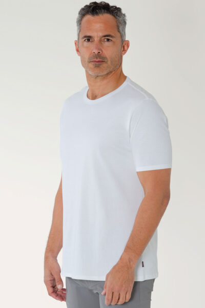 PI3039 liquid cotton pima tee on model side view color white